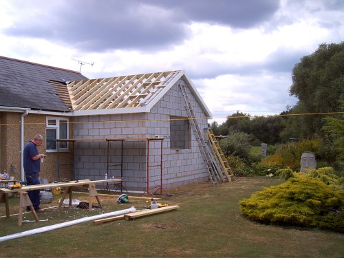Single storey block and render extension
