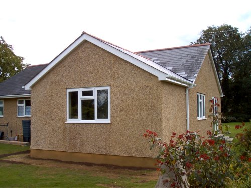Single storey block and render extension
